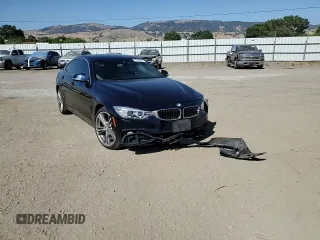 2016 BMW 4 Series 428i xDrive z VIN WBA4C9C55GG140032, wystawiony jako Copart lot #57702215 z przebiegiem 57 050 mil mil oraz Szkoda całkowita • Salvage title. Historia ofert i sprzedaży dostępna na DreamBid. Obrazek 13.