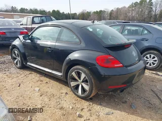 2012 Volkswagen Beetle 2.0T Turbo w/Sun/Snd/Nav PZEV with VIN 3VWVA7AT4CM655068, listed as a IAAI auction lot 41605197 with 115,546 mi miles. Bid and sale history available at carsss.com. Image 3.