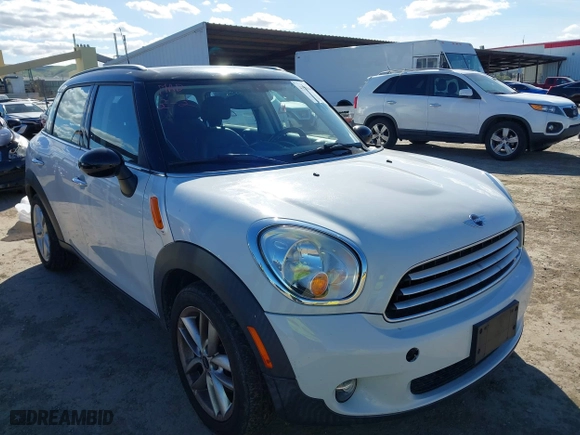 2013 MINI Cooper Countryman with VIN WMWZB3C51DWM31277, listed as a IAAI auction lot 41506486 with 79,006 mi miles. Bid and sale history available at carsss.com. Image 1.