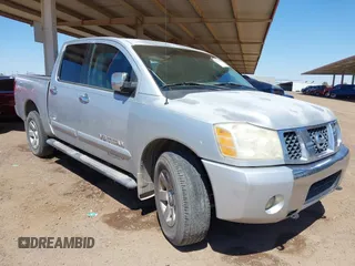 2005 Nissan Titan LE with VIN 1N6AA07B75N560551, listed as a IAAI auction lot 42576963 with 224,478 mi miles and . Bid and sale history available at DreamBid. Image 1.