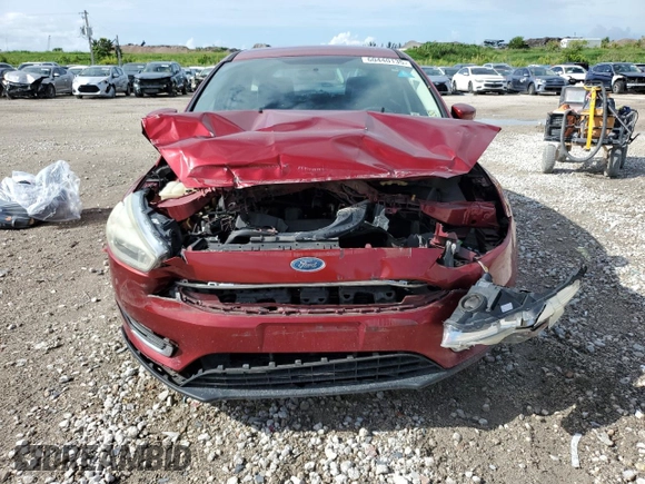 2016 Ford Focus Titanium с VIN 1FADP3N2XGL407427, выставлен на аукционе Copart как лот 60440135 с пробегом 121 892 миль миль и Списание • Salvage title. История ставок и продаж доступна на DreamBid. Изображение 5.