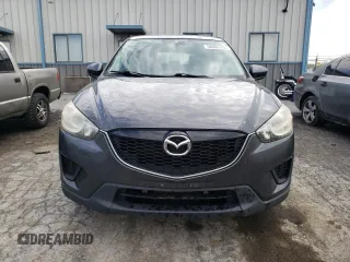 2014 Mazda CX-5 Sport with VIN JM3KE2BE9E0372370, listed as a Copart auction lot 58980165 with 175,477 mi miles and Salvage title. Bid and sale history available at DreamBid. Image 5.