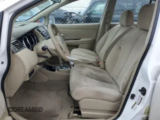 2007 Nissan Versa 1.8 SL with VIN 3N1BC11E67L402475, listed as a Copart auction lot 84464734 with 62,399 mi miles and Salvage Title. Bid and sale history available at carsss.com. Image 7.