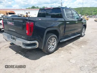 2022 GMC Sierra 1500 SLT with VIN 3GTU9DED5NG118655, listed as a IAAI auction lot 42183803 with 92,881 mi miles and . Bid and sale history available at DreamBid. Image 4.