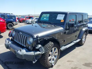 2018 Jeep Wrangler JK Unlimited Altitude with VIN 1C4BJWEG9JL802853, listed as a IAAI auction lot 41993420 with 51,742 mi miles. Bid and sale history available at carsss.com. Image 6.