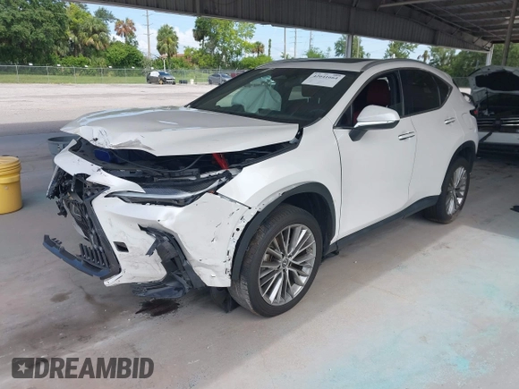 2023 Lexus NX 350h Premium z VIN 2T2GKCEZ2PC010333, wystawiony jako IAAI lot #42641664 z przebiegiem 35 369 mil mil oraz . Historia ofert i sprzedaży dostępna na DreamBid. Obrazek 18.