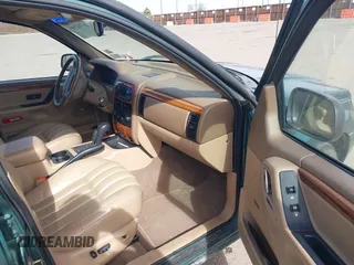 1999 Jeep Grand Cherokee Limited with VIN 1J4GW68N4XC544651, listed as a IAAI auction lot 41742346 with 94,904 mi miles and . Bid and sale history available at DreamBid. Image 5.