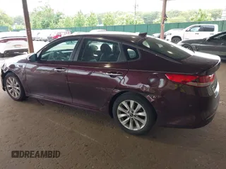 2016 Kia Optima LX with VIN 5XXGT4L32GG021055, listed as a IAAI auction lot 42424285 with 285,318 mi miles and . Bid and sale history available at DreamBid. Image 3.