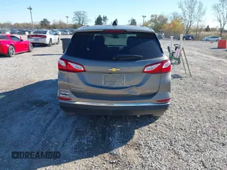 2018 Chevrolet Equinox LT z VIN 3GNAXSEV7JS621706, wystawiony jako IAAI lot #40760827 z przebiegiem 36 051 mil mil oraz . Historia ofert i sprzedaży dostępna na DreamBid. Obrazek 16.