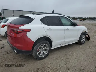 2020 Alfa Romeo Stelvio z VIN ZASPAJAN1L7C92420, wystawiony jako Copart lot #41972755 z przebiegiem Nie podano mil oraz Nie do naprawy. Historia ofert i sprzedaży dostępna na DreamBid. Obrazek 3.