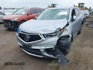 2020 Acura MDX with VIN 5J8YD3H32LL016504, listed as a IAAI auction lot 42126961 with 90,307 mi miles and . Bid and sale history available at DreamBid. Image 2.