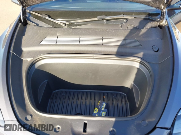 2023 Tesla Model Y Long Range with VIN 7SAYGDEE0PF928836, listed as a IAAI auction lot 41538742 with 9,630 mi miles and . Bid and sale history available at DreamBid. Image 10.