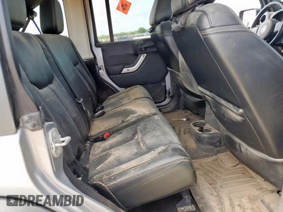 2015 Jeep Wrangler Unlimited Rubicon z VIN 1C4BJWFG0FL529310, wystawiony jako Copart lot #64337405 z przebiegiem Nie podano mil oraz Szkoda całkowita • Salvage title. Historia ofert i sprzedaży dostępna na DreamBid. Obrazek 10.