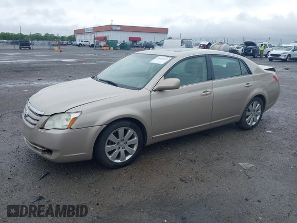 2006 Toyota Avalon XL with VIN 4T1BK36B26U119629, listed as a IAAI auction lot 39152919 with 128,953 mi miles. Bid and sale history available at carsss.com. Image 2.