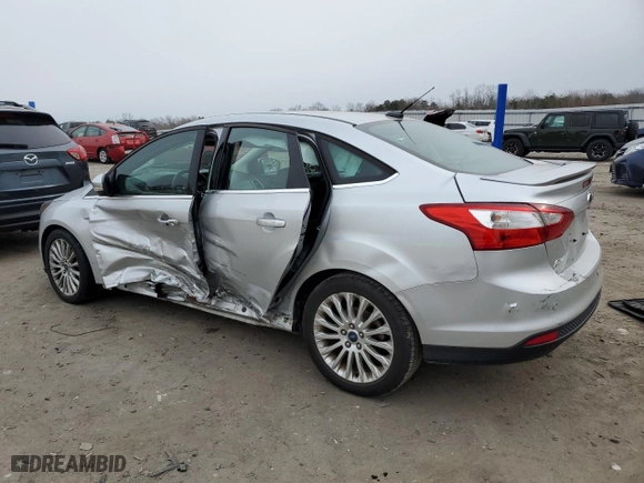2012 Ford Focus Titanium with VIN 1FAHP3J21CL293447, listed as a Copart auction lot 43963615 with 151,448 mi miles and Salvage Title. Bid and sale history available at carsss.com. Image 2.