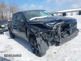 2015 Ram 1500 Express z VIN 1C6RR7KT5FS588494, wystawiony jako IAAI lot #41321894 z przebiegiem 300 261 mil mil oraz . Historia ofert i sprzedaży dostępna na DreamBid. Obrazek 1.