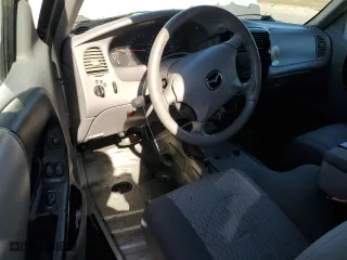 2002 Mazda B-Series 2WD Truck DS with VIN 4F4YR16U32TM09501, listed as a Copart auction lot 76968614 with 209,252 mi miles and Salvage Title. Bid and sale history available at carsss.com. Image 8.