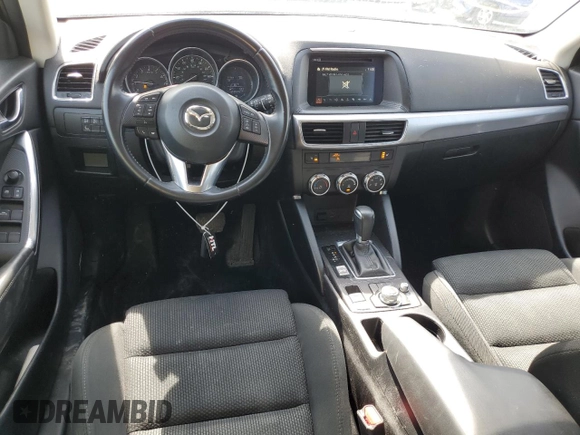 2016 Mazda CX-5 Touring with VIN JM3KE2CY8G0902131, listed as a Copart auction lot 53354745 with 123,474 mi miles and Salvage Title. Bid and sale history available at carsss.com. Image 8.