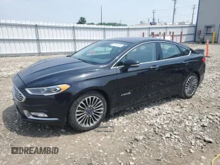 2017 Ford Fusion Hybrid Titanium with VIN 3FA6P0RU1HR328833, listed as a Copart auction lot 59381085 with 145,467 mi miles and Clean title. Bid and sale history available at DreamBid. Image 1.