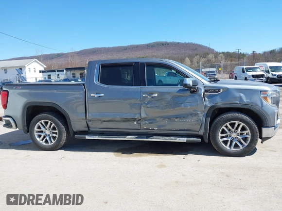2021 GMC Sierra 1500 SLT z VIN 3GTU9DED7MG224460, wystawiony jako IAAI lot #41848912 z przebiegiem 65 319 mil mil oraz . Historia ofert i sprzedaży dostępna na DreamBid. Obrazek 6.