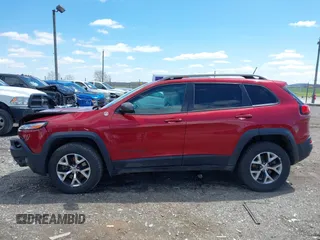 2015 Jeep Cherokee Trailhawk with VIN 1C4PJMBS0FW728361, listed as a IAAI auction lot 41978853 with 123,127 mi miles. Bid and sale history available at carsss.com. Image 14.