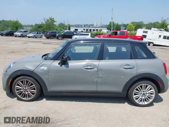 2019 MINI Hardtop 4 Door Cooper S with VIN WMWXU3C57K2H54547, listed as a IAAI auction lot 42492037 with 74,657 mi miles and . Bid and sale history available at DreamBid. Image 6.