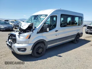 2022 Ford Transit Passenger XL z VIN 1FBAX9CG0NKA74063, wystawiony jako Copart lot #62737305 z przebiegiem Nie podano mil oraz Czysty tytuł • Clean title. Historia ofert i sprzedaży dostępna na DreamBid. Obrazek 1.