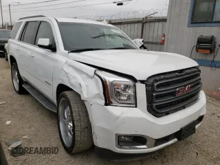 2017 GMC Yukon SLT with VIN 1GKS2BKC9HR125757, listed as a Copart auction lot 73427934 with 72,333 mi miles and Salvage Title. Bid and sale history available at carsss.com. Image 4.