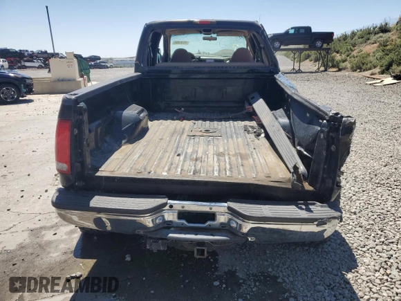 2000 Ford F-250 XL с VIN 1FTNW21F7YEB23621, выставлен на аукционе Copart как лот 58291985 с пробегом 206 808 миль миль и Списание • Salvage title. История ставок и продаж доступна на DreamBid. Изображение 6.