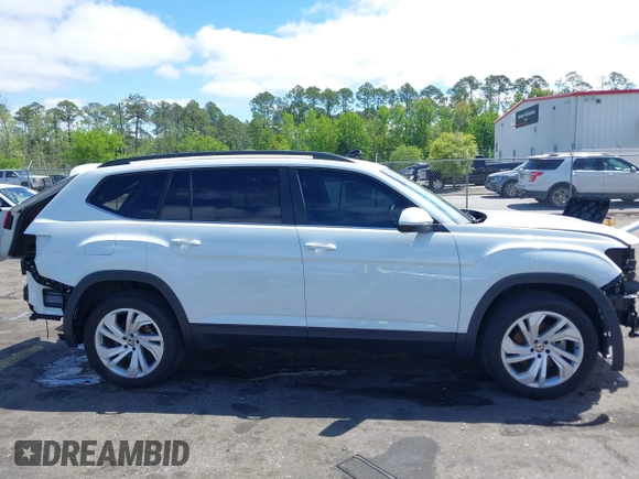 2021 Volkswagen Atlas SE z VIN 1V2WR2CA2MC529355, wystawiony jako IAAI lot #41972048 z przebiegiem 63 970 mil mil oraz . Historia ofert i sprzedaży dostępna na DreamBid. Obrazek 13.