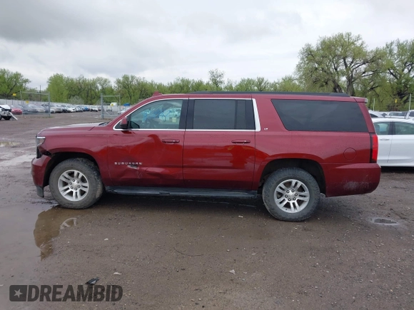 2020 Chevrolet Suburban LT with VIN 1GNSKHKC9LR233603, listed as a IAAI auction lot 41311582 with 104,754 mi miles. Bid and sale history available at carsss.com. Image 14.