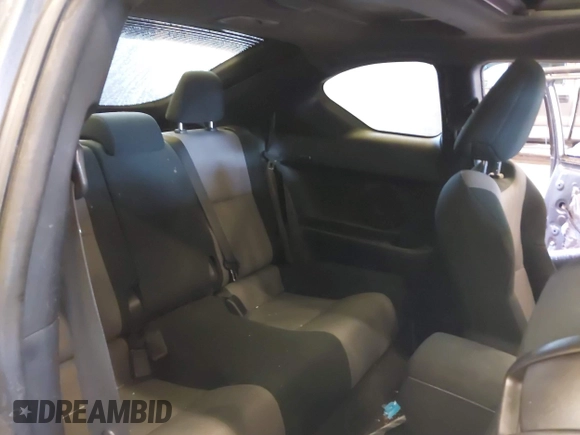 2014 Scion tC with VIN JTKJF5C77E3069906, listed as a IAAI auction lot 41243445 with 128,791 mi miles. Bid and sale history available at carsss.com. Image 8.