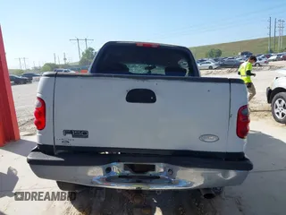 2003 Ford F-150 XLT with VIN 1FTRW08L63KA28964, listed as a IAAI auction lot 41689700 with 303,789 mi miles. Bid and sale history available at carsss.com. Image 17.