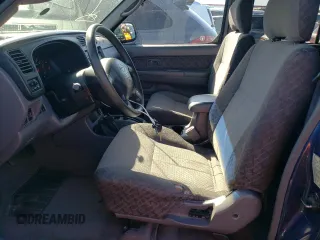 2000 Nissan Xterra XE z VIN 5N1ED28Y1YC549518, wystawiony jako Copart lot #49359015 z przebiegiem 179 001 mil mil oraz Szkoda całkowita • Salvage title. Historia ofert i sprzedaży dostępna na DreamBid. Obrazek 7.