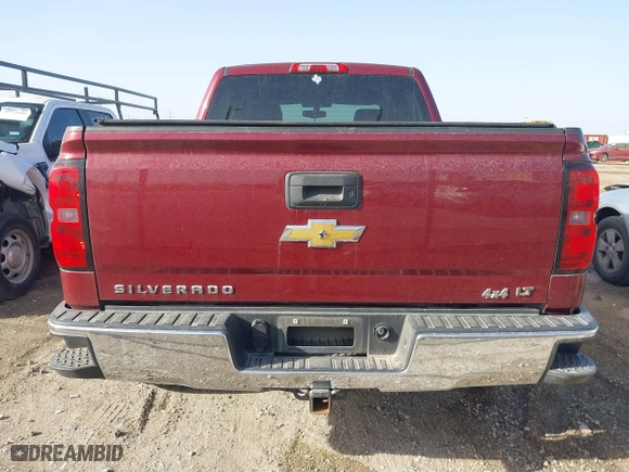 2014 Chevrolet Silverado 1500 LT with VIN 3GCUKREH4EG284122, listed as a IAAI auction lot 41667059 with 243,251 mi miles. Bid and sale history available at carsss.com. Image 16.