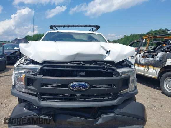 2018 Ford F-150 XL with VIN 1FTEX1CB5JFE55932, listed as a IAAI auction lot 42298917 with 143,923 mi miles and . Bid and sale history available at DreamBid. Image 12.
