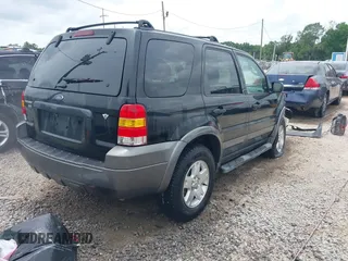 2006 Ford Escape XLT with VIN 1FMYU03156KA84031, listed as a IAAI auction lot 42276336 with 136,038 mi miles and . Bid and sale history available at DreamBid. Image 4.