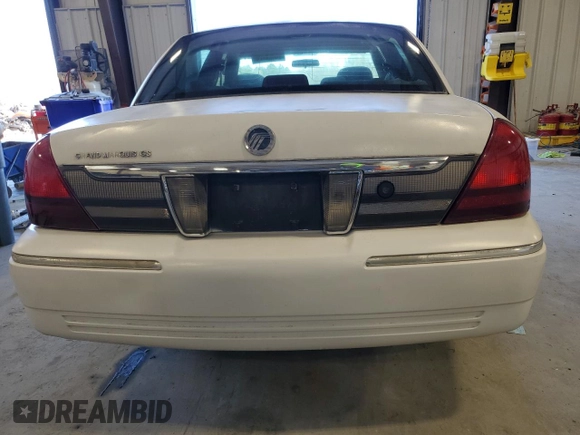 2006 Mercury Grand Marquis GS z VIN 2MEFM74V96X621050, wystawiony jako Copart lot #49098465 z przebiegiem 75 561 mil mil oraz Szkoda całkowita • Salvage title. Historia ofert i sprzedaży dostępna na DreamBid. Obrazek 6.