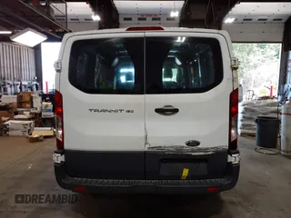 2015 Ford Transit Cargo with VIN 1FTNE1ZM8FKB17731, listed as a IAAI auction lot 42351353 with 74,489 mi miles and . Bid and sale history available at DreamBid. Image 16.