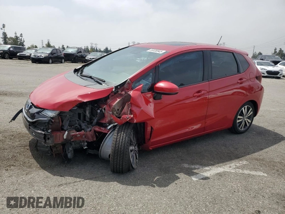 2015 Honda Fit EX-L with VIN 3HGGK5H87FM701108, listed as a Copart auction lot 55536945 with 57,519 mi miles and Salvage title. Bid and sale history available at DreamBid. Image 1.