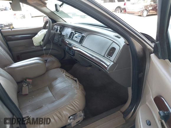 2003 Mercury Grand Marquis LS Premium with VIN 2MEFM75W23X613004, listed as a IAAI auction lot 41974625 with 151,023 mi miles and . Bid and sale history available at DreamBid. Image 5.
