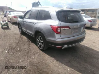 2022 Honda Pilot Touring 7-Passenger with VIN 5FNYF6H60NB013465, listed as a IAAI auction lot 40139627 with 78,161 mi miles. Bid and sale history available at carsss.com. Image 3.