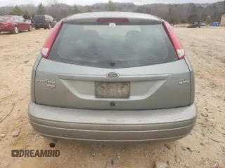 2006 Ford Focus S with VIN 1FAHP37N76W180039, listed as a Copart auction lot 58328565 with 220,696 mi miles and Salvage title. Bid and sale history available at DreamBid. Image 6.