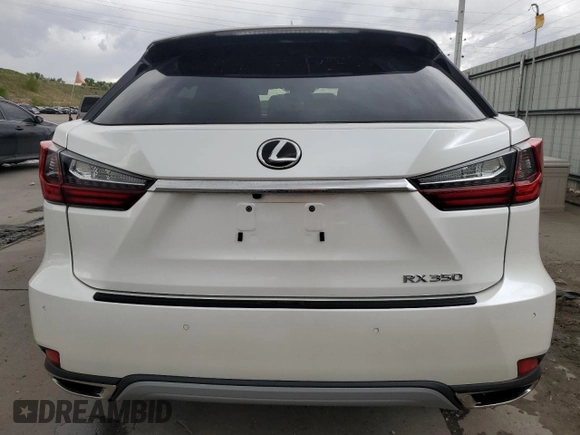 2021 Lexus RX 350 with VIN JTJHZMDA7M2051652, listed as a Copart auction lot 57218985 with 17,013 mi miles and Salvage title. Bid and sale history available at DreamBid. Image 6.