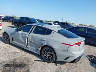 2023 Kia Stinger GT-Line with VIN KNAE35LD3P6136247, listed as a IAAI auction lot 41969093 with 27,905 mi miles. Bid and sale history available at carsss.com. Image 3.