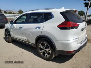 2017 Nissan Rogue SL with VIN 5N1AT2MT3HC751952, listed as a Copart auction lot 60842915 with 75,606 mi miles and Salvage title. Bid and sale history available at DreamBid. Image 2.