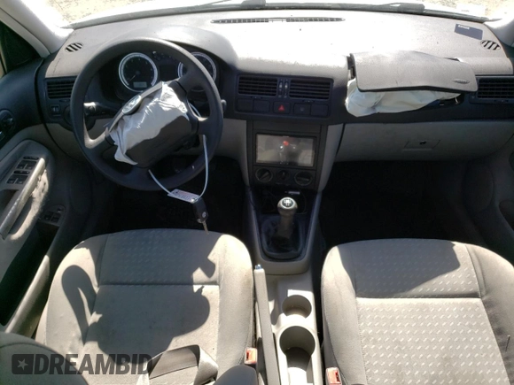 2004 Volkswagen Jetta GL z VIN 3VWRA69M54M007376, wystawiony jako Copart lot #72288984 z przebiegiem 91 687 mil mil oraz Szkoda całkowita • Salvage title. Historia ofert i sprzedaży dostępna na DreamBid. Obrazek 8.