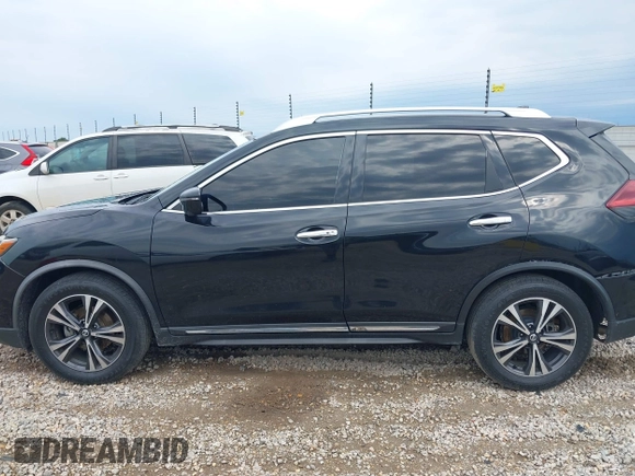 2018 Nissan Rogue SV with VIN JN8AT2MT8JW465012, listed as a IAAI auction lot 39376292 with 184,861 mi miles and . Bid and sale history available at DreamBid. Image 14.