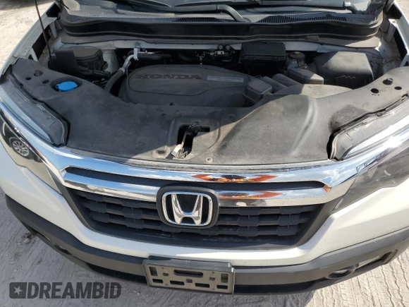 2018 Honda Ridgeline RTL-T z VIN 5FPYK3F6XJB000205, wystawiony jako Copart lot #51861315 z przebiegiem 83 684 mil mil oraz Nie do naprawy • Non repairable. Historia ofert i sprzedaży dostępna na DreamBid. Obrazek 11.