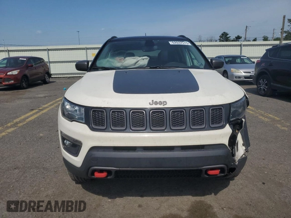 2019 Jeep Compass Trailhawk with VIN 3C4NJDDB5KT647778, listed as a Copart auction lot 62032515 with 51,505 mi miles and Salvage title. Bid and sale history available at DreamBid. Image 5.